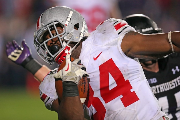 EVANSTON, IL - OCTOBER 05:  Carlos Hyde #34 of the Ohio State Buckeyes scores a second half touchdown against the Northwestern Wildcats at Ryan Field on October 5, 2013 in Evanston, Illinois. Ohio State defeated Northwestern 40-30.  (Photo by Jonathan Daniel/Getty Images)