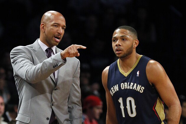 New Orleans Pelicans head coach Monty Williams directs Pelicans' Eric Gordon (10) in an NBA basketball game against the Brooklyn Nets on Sunday, Feb. 9, 2014, in New York.  The Nets won 93-81. ( AP Photo/Paul J. Bereswill)