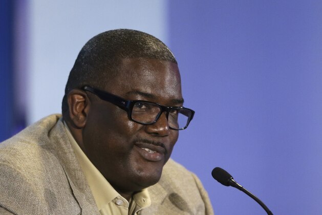 The Detroit Pistons President of Basketball Operations Joe Dumars is seen during a news conference at the Palace of Auburn Hills, Mich., where guard Brandon Jennings was introduced to the media, Tuesday, Aug. 6, 2013. Jennings comes from the Milwaukee Bucks, who acquired Brandon Knight, Slava Kravtsov and Khris Middleton in a sign-and-trade deal last week. Jennings signed a 3-year, $24-million deal as part of the deal. (AP Photo/Carlos Osorio)
