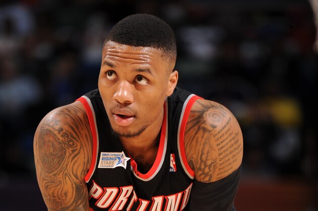 NEW ORLEANS, LA - FEBRUARY 14: Damian Lillard of Team Hill during the BBVA Compass Rising Stars Challenge at the Smoothie King Center on February 14, 2014 in New Orleans, Louisiana. NOTE TO USER: User expressly acknowledges and agrees that, by downloading and/or using this Photograph, user is consenting to the terms and conditions of the Getty Images License Agreement. Mandatory Copyright Notice: Copyright 2014 NBAE (Photo by Andrew D. Bernstein/NBAE via Getty Images)