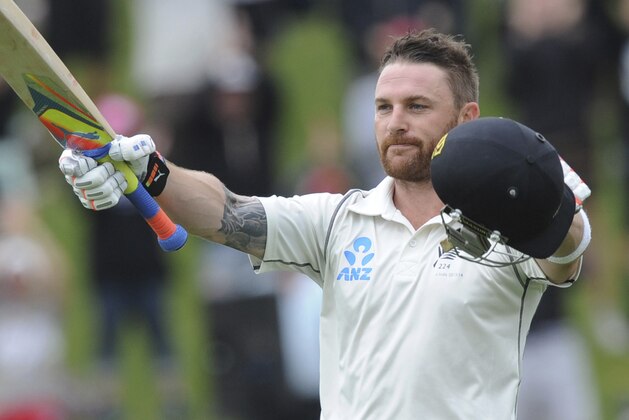 New Zealand’s Brendon McCullum celebrates his triple century against India on the final day of the second test  at the Basin Reserve in Wellington, New Zealand, Tuesday, Feb. 18, 2014. (AP Photo/SNPA, Ross Setford) NEW ZEALAND OUT