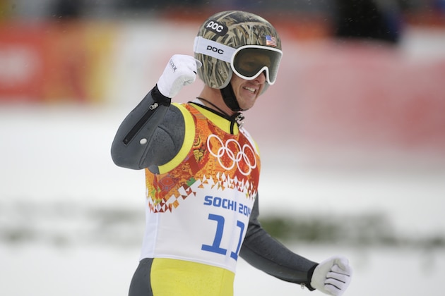 United States' Todd Lodwick celebrates after his attempt during the Nordic combined individual Gundersen large hill competition at the 2014 Winter Olympics, Tuesday, Feb. 18, 2014, in Krasnaya Polyana, Russia. (AP Photo/Gregorio Borgia)