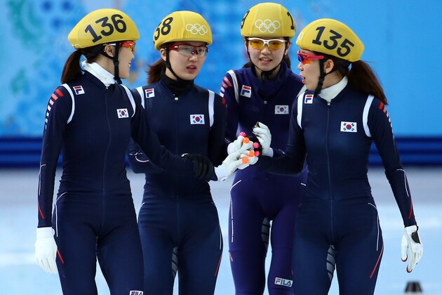SOCHI, RUSSIA - FEBRUARY 18:  Alang Kim, Seung-Hi Park, Suk Hee Shim and Ha-Ri Cho of South Korea look on before competing in the Short Track Ladies' 3000m Relay Final A at Iceberg Skating Palace on day 11 of the 2014 Sochi Winter Olympics on February 18, 2014 in Sochi, Russia.  (Photo by Streeter Lecka/Getty Images)