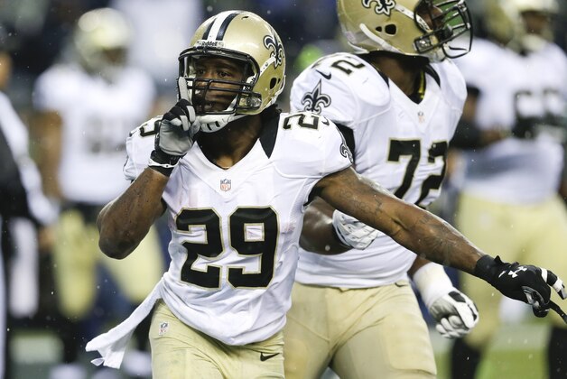 New Orleans Saints running back Khiry Robinson (29) celebrates after running for a 1-yard touchdown during the fourth quarter of an NFC divisional playoff NFL football game against the Seattle Seahawks in Seattle, Saturday, Jan. 11, 2014. (AP Photo/Ted S. Warren)