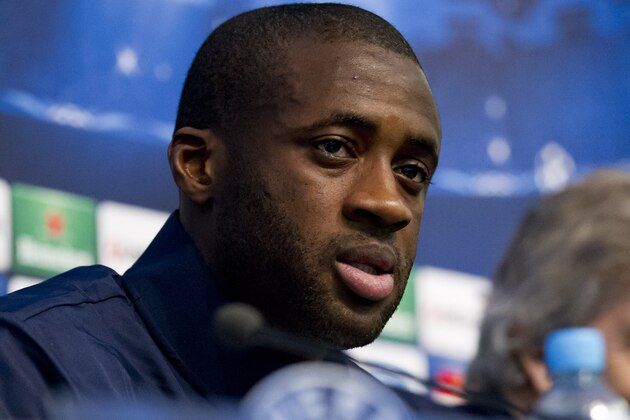 Manchester City's Yaya Toure answers questions during a press conference at the Etihad Stadium, Manchester, England, Monday Feb. 17, 2014. Manchester City will play Barcelona on Tuesday in a Champions League first knock out round soccer match. (AP Photo/Jon Super)