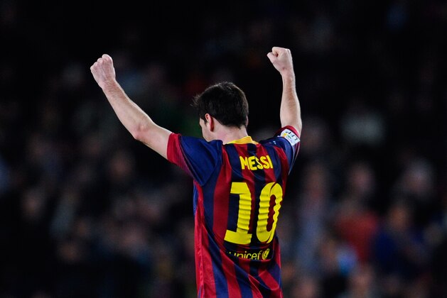 BARCELONA, SPAIN - FEBRUARY 15:  Lionel Messi of FC Barcelona celebrates after scoring his team's second goal during the La Liga match between Barcelona and Rayo Vallecano de Madrid at Camp Nou on February 15, 2014 in Barcelona, Spain.  (Photo by David Ramos/Getty Images)