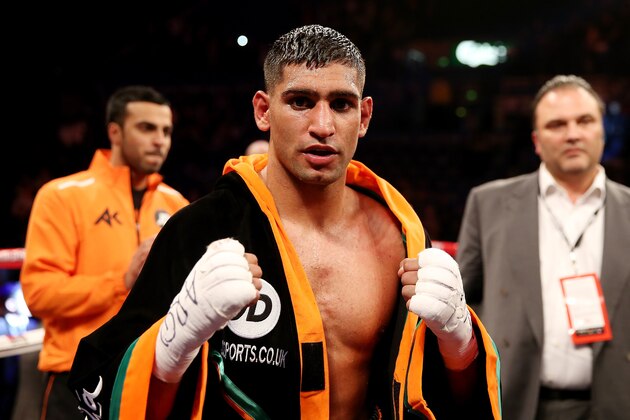 SHEFFIELD, ENGLAND - APRIL 27:  Amir Khan celebrates his victory over Julio Diaz at Motorpoint Arena on April 27, 2013 in Sheffield, England.  (Photo by Scott Heavey/Getty Images)