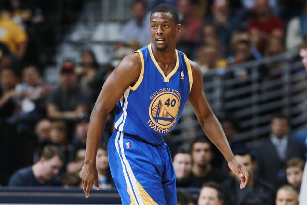 Golden State Warriors forward Harrison Barnes takes court against the Denver Nuggets in the first quarter of an NBA basketball game in Denver on Monday, Dec. 23, 2013. (AP Photo/David Zalubowski)
