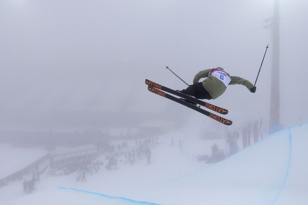 Yannic Lerjen from Switzerland trains in the halfpipe during a freestyle skiing training session at the Rosa Khutor Extreme Park, at the 2014 Winter Olympics, Monday, Feb. 17, 2014, in Krasnaya Polyana, Russia. (AP Photo/Sergei Grits)