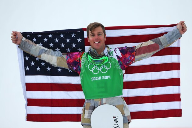 SOCHI, RUSSIA - FEBRUARY 18:  Bronze medalist Alex Deibold of the United States celebrates on the podium during the flower ceremony for the Men's Snowboard Cross Final on day eleven of the 2014 Winter Olympics at Rosa Khutor Extreme Park on February 18, 2014 in Sochi, Russia.  (Photo by Mike Ehrmann/Getty Images)