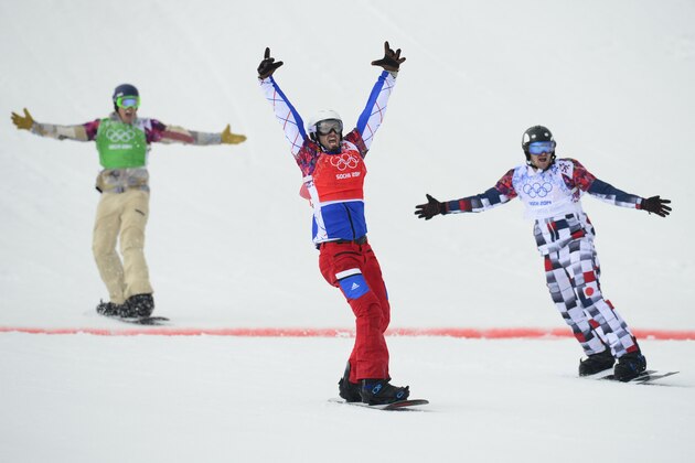 Feb 18, 2014; Krasnaya Polyana, RUSSIA; Pierre Vaultier (FRA), red, ahead of ALex Deibold (USA), green) and Nikolay Olyunin (RUS), white, during the big final run of the men's snowboard cross finals during the Sochi 2014 Olympic Winter Games at Rosa Khutor Extreme Park.  Mandatory Credit: John David Mercer-USA TODAY Sports