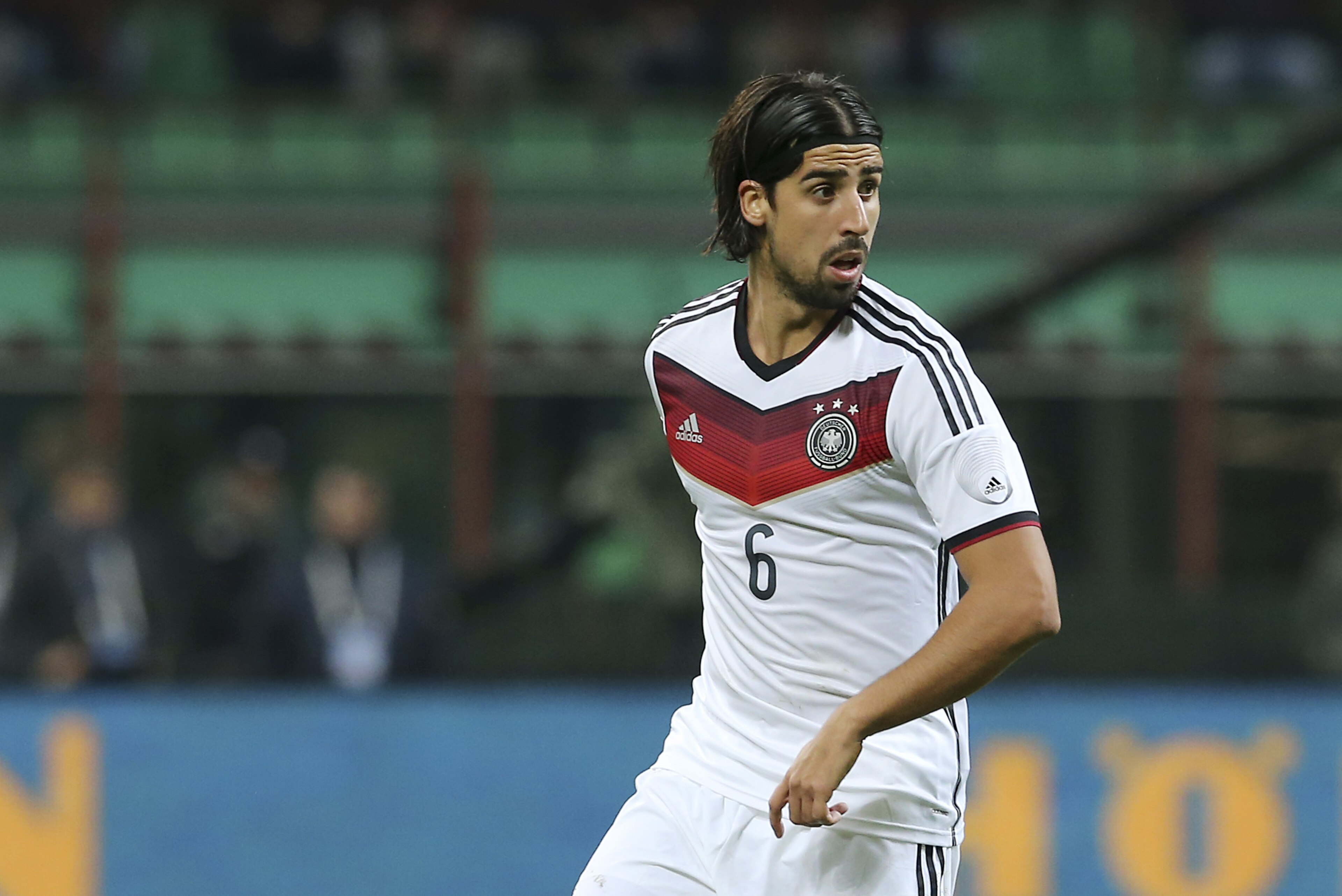 Germany midfielder Sami Khedira controls the ball during a friendly soccer match between Italy and Germany at the San Siro  stadium in Milan, Italy, Friday, Nov. 15, 2013. (AP Photo/Antonio Calanni)