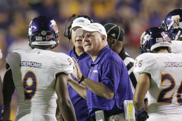 Northwestern State Demons head coach  Bradley Dale Peveto talks to his team during the LSU-Northwestern State football game in Baton Rouge,  La., Saturday, Sept. 10, 2011. (AP Photo/Bill Haber)