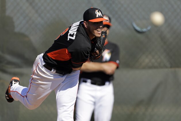 Miami Marlins pitcher Jose Fernandez throws a bullpen session during spring training baseball practice Sunday, Feb. 16, 2014, in Jupiter, Fla. (AP Photo/Jeff Roberson)