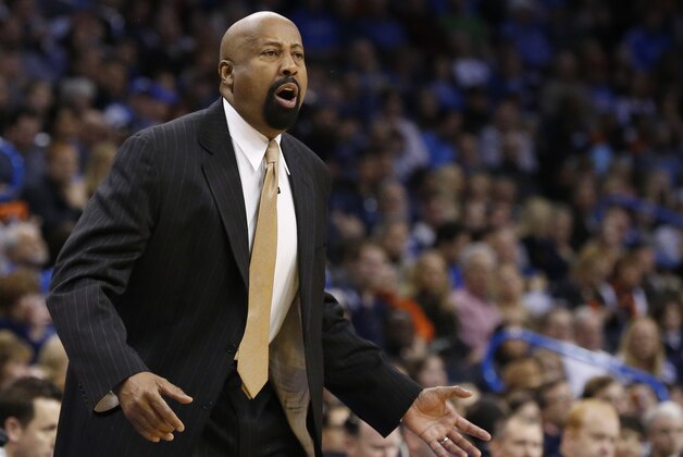 New York Knicks head coch Mike Woodson shouts in the first quarter of an NBA basketball game against the Oklahoma City Thunder in Oklahoma City, Sunday, Feb. 9, 2014. (AP Photo/Sue Ogrocki)