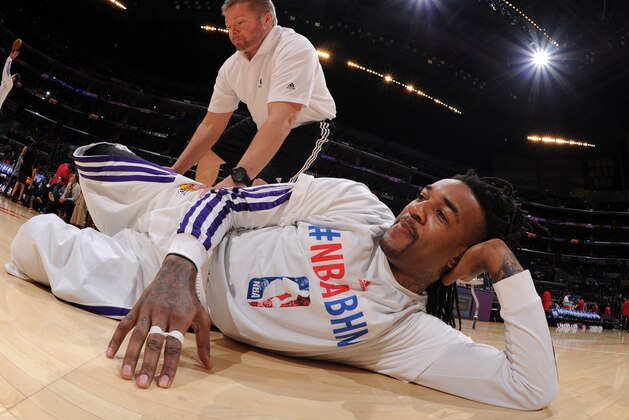 LOS ANGELES, CA - FEBRUARY 9: Jordan Hill #27 of the Los Angeles Lakers stretches before a game against the Chicago Bulls at STAPLES Center on February 9, 2014 in Los Angeles, California. NOTE TO USER: User expressly acknowledges and agrees that, by downloading and/or using this Photograph, user is consenting to the terms and conditions of the Getty Images License Agreement. Mandatory Copyright Notice: Copyright 2014 NBAE (Photo by Andrew D. Bernstein/NBAE via Getty Images)