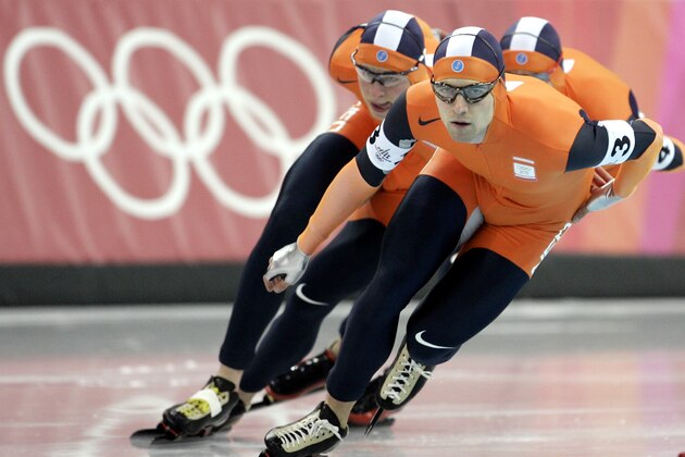 Netherlands' Mark Tuitert leads the team during the final of the Winter Olympics speedskating men's team pursuit at the Oval Lingotto in Turin, Italy, Thursday, Feb. 16, 2006.  The Dutch team won the bronze medal in the event.  (AP Photo/Matt Dunham)