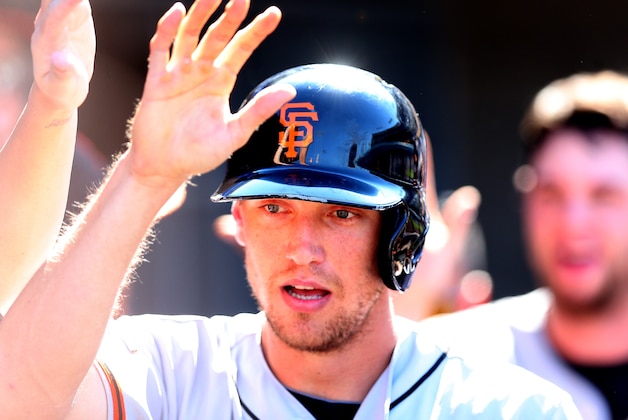 LOS ANGELES, CA - SEPTEMBER 15:  Hunter Pence #8 of the San Francisco Giants celebrates in the dugout after hitting a two run home run in the sixth inning for his second home run of the game against the Los Angeles Dodgers at Dodger Stadium on September 15, 2013 in Los Angeles, California.  (Photo by Stephen Dunn/Getty Images)