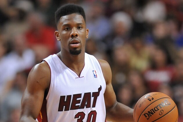 Jan 2, 2014; Miami, FL, USA; Miami Heat point guard Norris Cole (30) dribbles against the Golden State Warriors during the second half at American Airlines Arena. Mandatory Credit: Steve Mitchell-USA TODAY Sports Jan 2, 2014; Miami, FL, USA; Miami Heat point guard Norris Cole (30) dribbles against the Golden State Warriors during the second half at American Airlines Arena. Mandatory Credit: Steve Mitchell-USA TODAY Sports