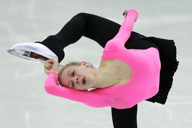 Polina Edmunds of the United States skates during a practice session at the figure stating practice rink at the 2014 Winter Olympics, Monday, Feb. 17, 2014, in Sochi, Russia. (AP Photo/Darron Cummings)