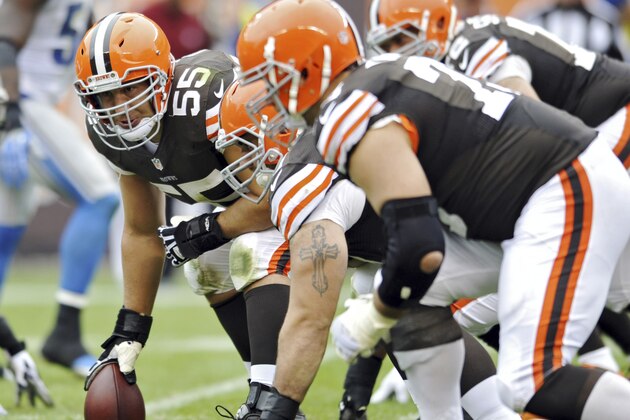 FILE - In this Oct. 13, 2013 file photo, Cleveland Browns center Alex Mack looks down the line in the fourth quarter of an NFL football game against the Detroit Lions in Cleveland. The steady center, who has not missed a snap since joining the Browns in 2009, is eligible for free agency and could walk away from the only NFL team he has known. (AP Photo/David Richard)