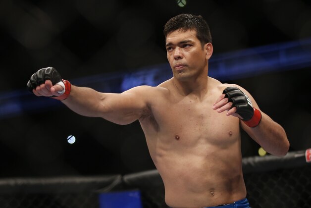 Lyoto Machida Dan Henderson during their UFC 157 light heavyweight mixed martial arts match in Anaheim, Calif., Saturday, Feb. 23, 2013. Machida won by split decision after the third round. (AP Photo/Jae C. Hong)