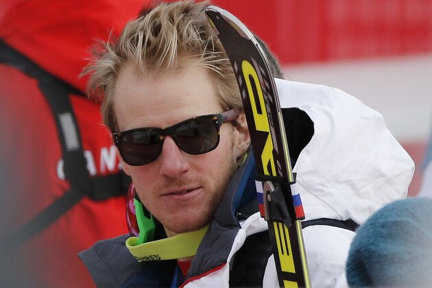 United States' Ted Ligety stands near the finish area after completing Men's super combined downhill training at the Sochi 2014 Winter Olympics, Tuesday, Feb. 11, 2014, in Krasnaya Polyana, Russia. (AP Photo/Christophe Ena)