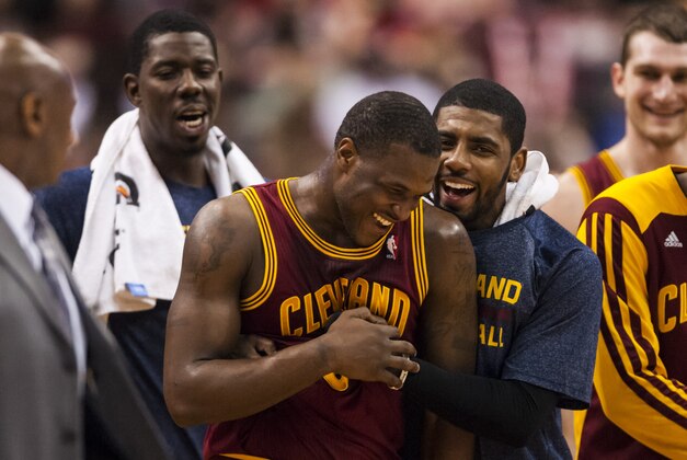 Feb 18, 2014; Philadelphia, PA, USA; Cleveland Cavaliers guard Dion Waiters (3) talks with teammates as he walks off the floor after being injured during the second quarter against the Philadelphia 76ers at the Wells Fargo Center. Mandatory Credit: Howard Smith-USA TODAY Sports