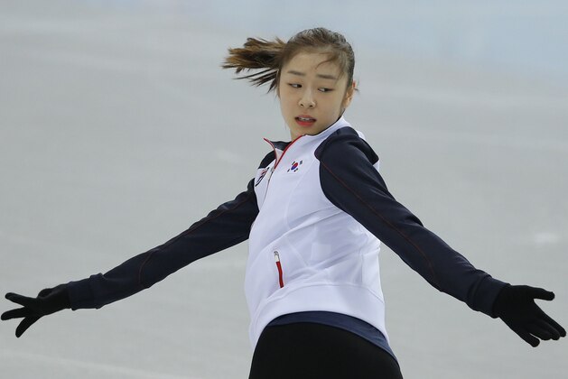Yuna Kim of South Korea skates during a practice session at the figure stating practice rink at the 2014 Winter Olympics, Monday, Feb. 17, 2014, in Sochi, Russia. (AP Photo/Vadim Ghirda)