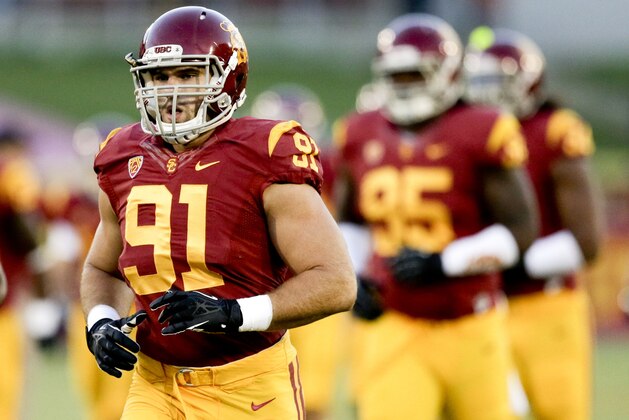 Southern California linebacker Morgan Breslin warms up the first half of an NCAA college football game against Washington State in Los Angeles, Saturday, Sept. 7, 2013. (AP Photo/Chris Carlson)