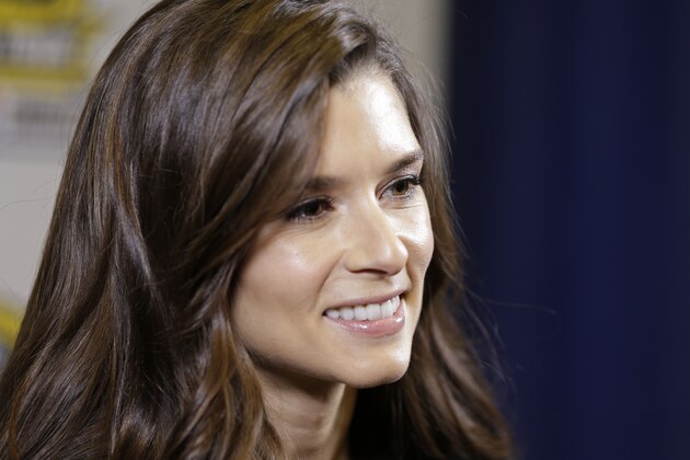 Danica Patrick answers a question during news conference at the NASCAR Sprint Cup auto racing Media Tour in Charlotte, N.C., Monday, Jan. 27, 2014. (AP Photo/Chuck Burton)
