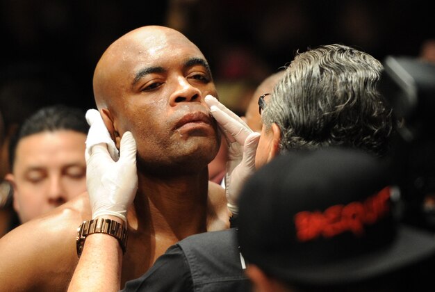 Jul 6, 2013; Las Vegas, NV, USA;  Anderson Silva (yellow shorts) gets ready to go into the cage for his Middleweight Chamionship Bout at the MGM Grand Garden Arena. Chris Weidman defeated Anderson in a TKO in the second round. Mandatory Credit: Jayne Kamin-Oncea-USA TODAY Sports