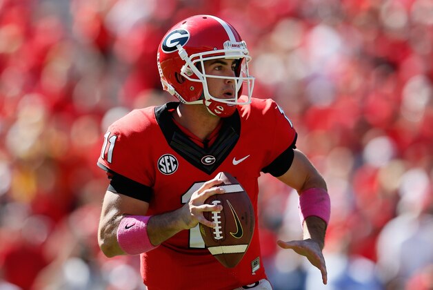 ATHENS, GA - OCTOBER 12:  Aaron Murray #11 of the Georgia Bulldogs rolls out against the Missouri Tigers at Sanford Stadium on October 12, 2013 in Athens, Georgia.  (Photo by Kevin C. Cox/Getty Images)