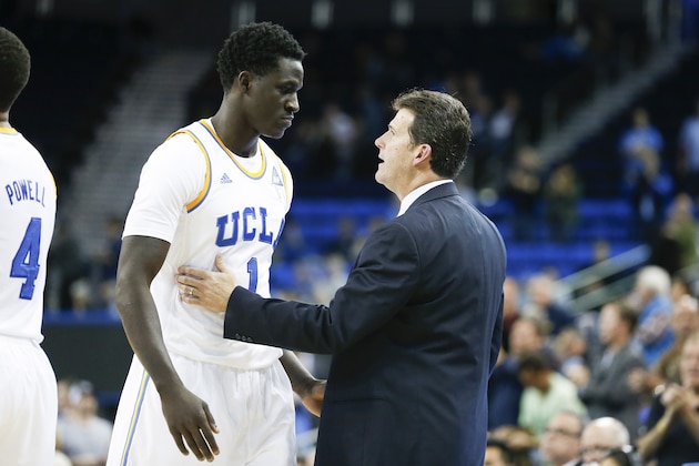 UCLA head coach Steve Alford, right, talks to Wanaah Bail, left, against UC Santa Barbara during the second half of an NCAA college basketball game, Tuesday, Dec. 3, 2013, in Los Angeles. UCLA won 89-76. (AP Photo/Danny Moloshok)
