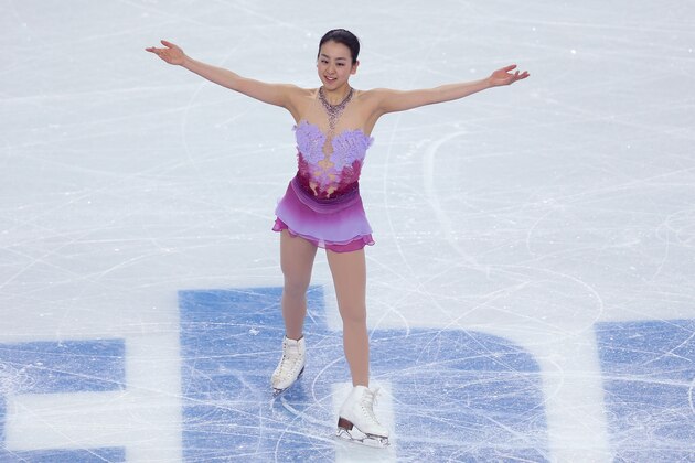 SOCHI, RUSSIA - FEBRUARY 08:  Mao Asada of Japan competes in the Figure Skating Team Ladies Short Program during day one of the Sochi 2014 Winter Olympics at Iceberg Skating Palace on February 8, 2014 in Sochi, Russia.  (Photo by Matthew Stockman/Getty Images)