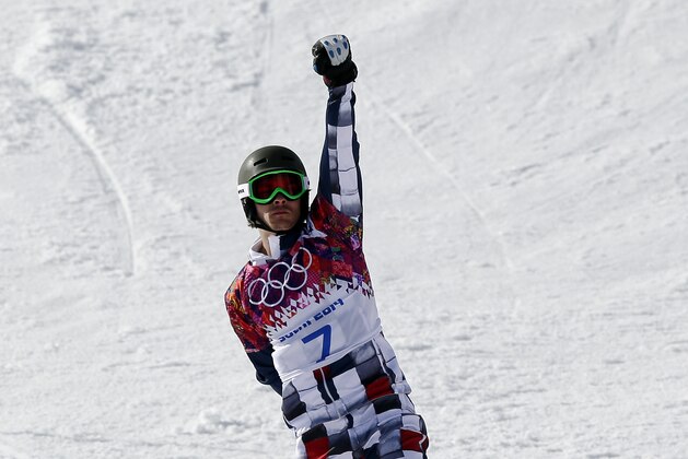 Russia's Vic Wild celebrates as he crosses the line to win the gold medal in the men's snowboard parallel giant slalom final at the Rosa Khutor Extreme Park, at the 2014 Winter Olympics, Wednesday, Feb. 19, 2014, in Krasnaya Polyana, Russia. (AP Photo/Andy Wong) Russia's Vic Wild celebrates as he crosses the line to win the gold medal in the men's snowboard parallel giant slalom final at the Rosa Khutor Extreme Park, at the 2014 Winter Olympics, Wednesday, Feb. 19, 2014, in Krasnaya Polyana, Russia. (AP Photo/Andy Wong)