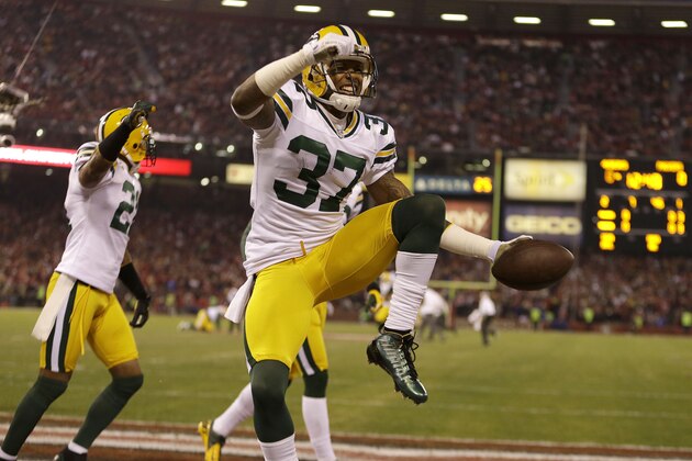 Green Bay Packers cornerback Sam Shields (37) celebrates after returning an interception from San Francisco 49ers quarterback Colin Kaepernick for a touchdown during the first quarter of an NFC divisional playoff NFL football game in San Francisco, Saturday, Jan. 12, 2013. (AP Photo/Ben Margot)