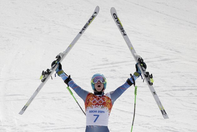 United States' Ted Ligety celebrates after winning the gold medal in the men's giant slalom at the Sochi 2014 Winter Olympics, Wednesday, Feb. 19, 2014, in Krasnaya Polyana, Russia.(AP Photo/Charlie Riedel)