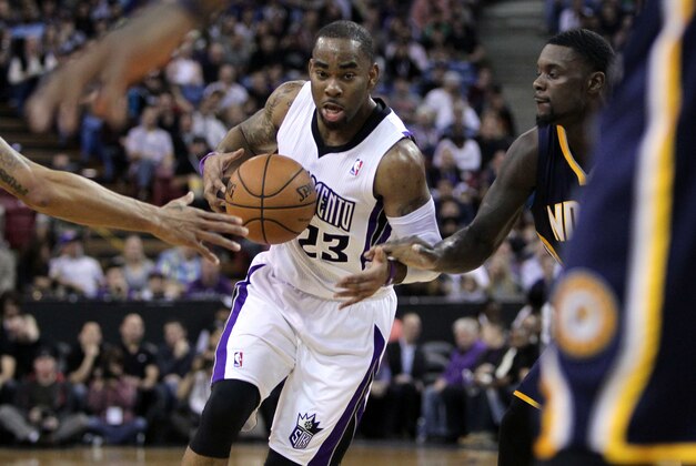 Jan 24, 2014; Sacramento, CA, USA; Sacramento Kings guard Marcus Thornton (23) drives the lane in front of Indiana Pacers defenders in the first half of their NBA basketball game at Sleep Train Arena. Mandatory Credit: Lance Iversen-USA TODAY Sports