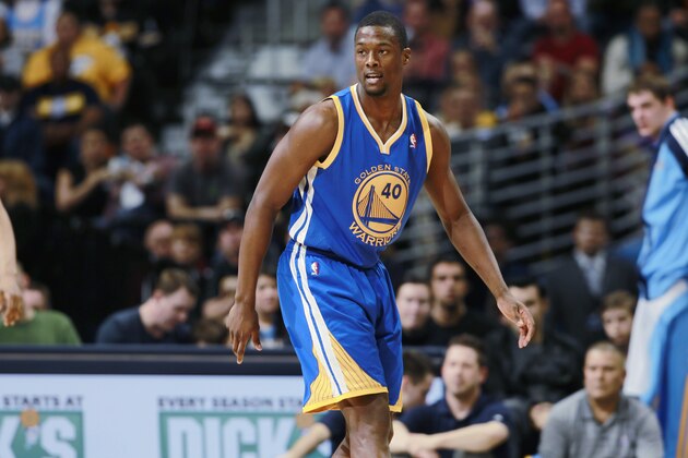 Golden State Warriors forward Harrison Barnes takes court against the Denver Nuggets in the first quarter of an NBA basketball game in Denver on Monday, Dec. 23, 2013. (AP Photo/David Zalubowski)