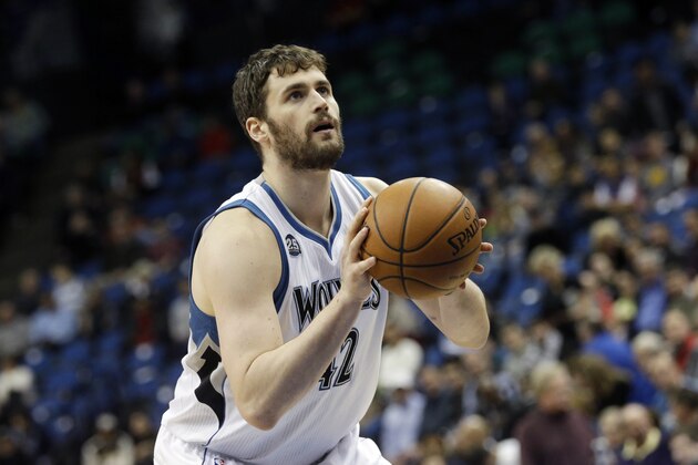 Minnesota Timberwolves' Kevin Love shoots a free throw in the second half of an NBA basketball game against the Houston Rockets, Monday, Feb. 10, 2014, in Minneapolis. The Rockets won 107-89. (AP Photo/Jim Mone)