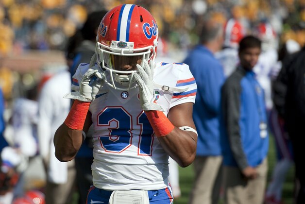 Florida's Cody Riggs walks off the field after being charged with targeting and ejected early in the first quarter of an NCAA college football game against Missouri Saturday, Oct. 19, 2013, in Columbia, Mo. Missouri won 36-17. (AP Photo/L.G. Patterson)