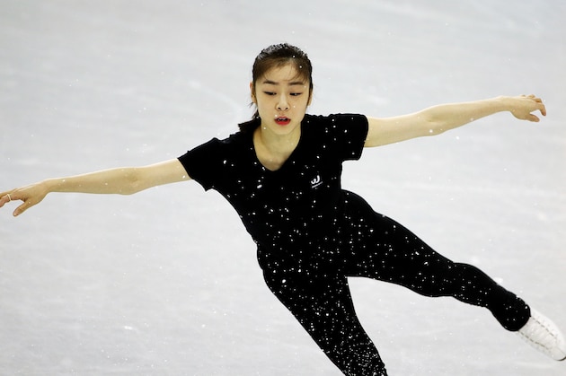 Yuna Kim of South Korea performs during a practice session at the figure skating practice rink at the 2014 Winter Olympics, Tuesday, Feb. 18, 2014, in Sochi, Russia. (AP Photo/David Goldman)