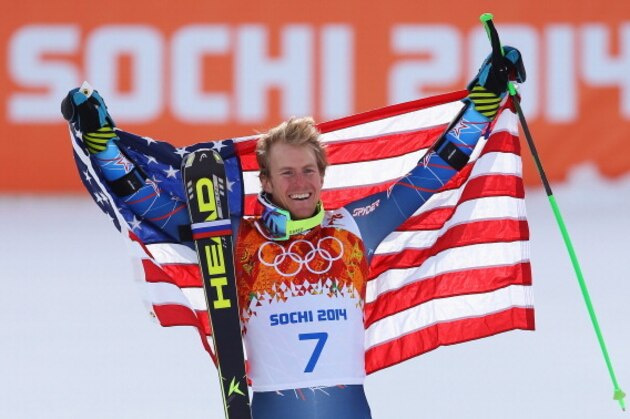 SOCHI, RUSSIA - FEBRUARY 19:  Gold medalist Ted Ligety of the United States celebrates during the flower ceremony for the the Alpine Skiing Men's Giant Slalom on day 12 of the Sochi 2014 Winter Olympics at Rosa Khutor Alpine Center on February 19, 2014 in Sochi, Russia.  (Photo by Doug Pensinger/Getty Images)