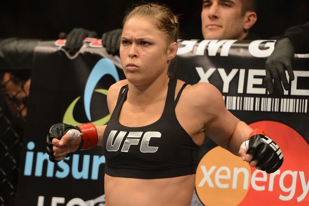 Dec 28, 2013; Las Vegas, NV, USA;   Ronda Rousey in the cage for her UFC Women's Bantamweight Championship Bout against Miesha Tate (not pictured) at the MGM Grand Garden Arena. Rousey won. Mandatory Credit: Jayne Kamin-Oncea-USA TODAY Sports