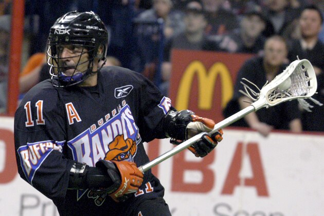 Buffalo Bandits lacrosse player John Tavares looks to shoot on net during a game against the Portland Lumberjax at the HSBC Arena in Buffalo, N.Y. Friday, Feb. 10, 2006. The 37-year-old Tavares has 530 goals and an NLL record 555 assists for 1,085 points, seven shy of Gary Gait, the National Lacrosse League's career leading scorer. He is averaging seven points a game this season, meaning the record could fall as early as Saturday when Buffalo hosts Minnesota. (AP Photo/Don Heupel)