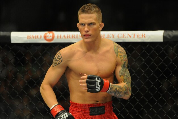 Aug 31, 2013; Milwaukee, WI, USA;  Erik Koch gets ready to fight during the UFC-164 bout at BMO Harris Bradley Center. Mandatory Credit: Benny Sieu-USA TODAY Sports