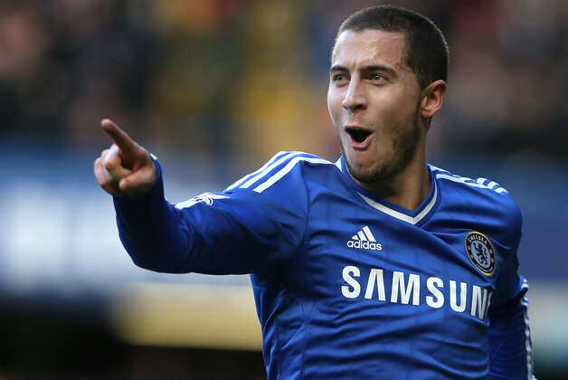 Chelsea's Eden Hazard celebrates after scoring  the opening goal against lNewcastle during their English Premier League soccer match between Chelsea and Newcastle United in London Saturday, Feb. 8, 2014. (AP Photo/Alastair Grant)