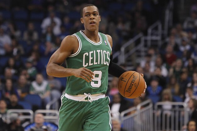 Jan 19, 2014; Orlando, FL, USA; Boston Celtics point guard Rajon Rondo (9) dribbles the ball against the Orlando Magic during the first quarter at Amway Center. Mandatory Credit: Kim Klement-USA TODAY Sports