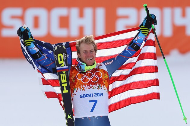 SOCHI, RUSSIA - FEBRUARY 19:  Gold medalist Ted Ligety of the United States celebrates during the flower ceremony for the the Alpine Skiing Men's Giant Slalom on day 12 of the Sochi 2014 Winter Olympics at Rosa Khutor Alpine Center on February 19, 2014 in Sochi, Russia.  (Photo by Doug Pensinger/Getty Images)